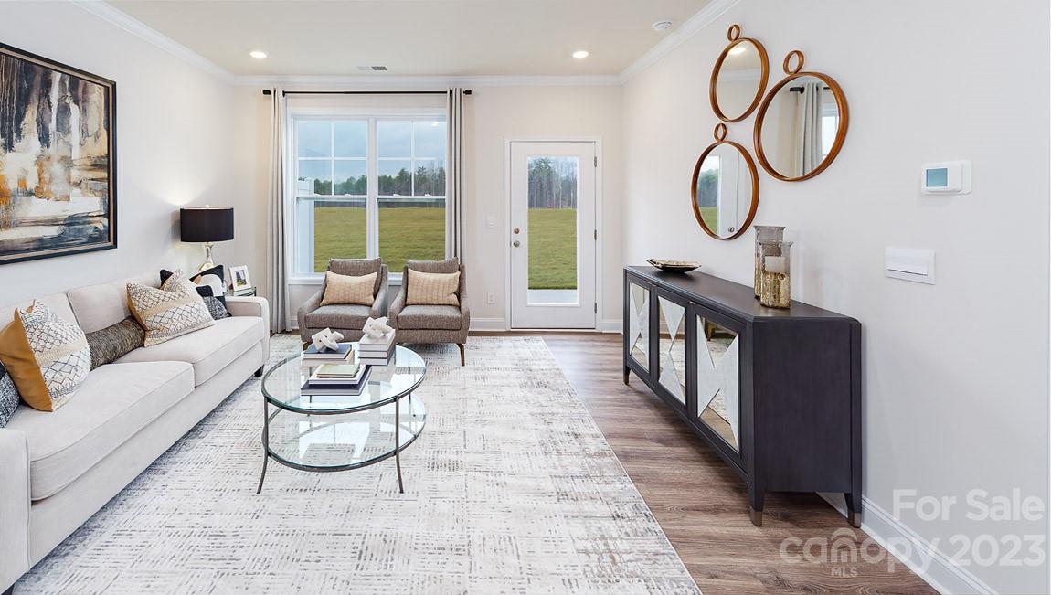 7903 Iron Road Sherrills Ford, NC 28673 - Photo 10 of 41 a living room with furniture a rug and a window