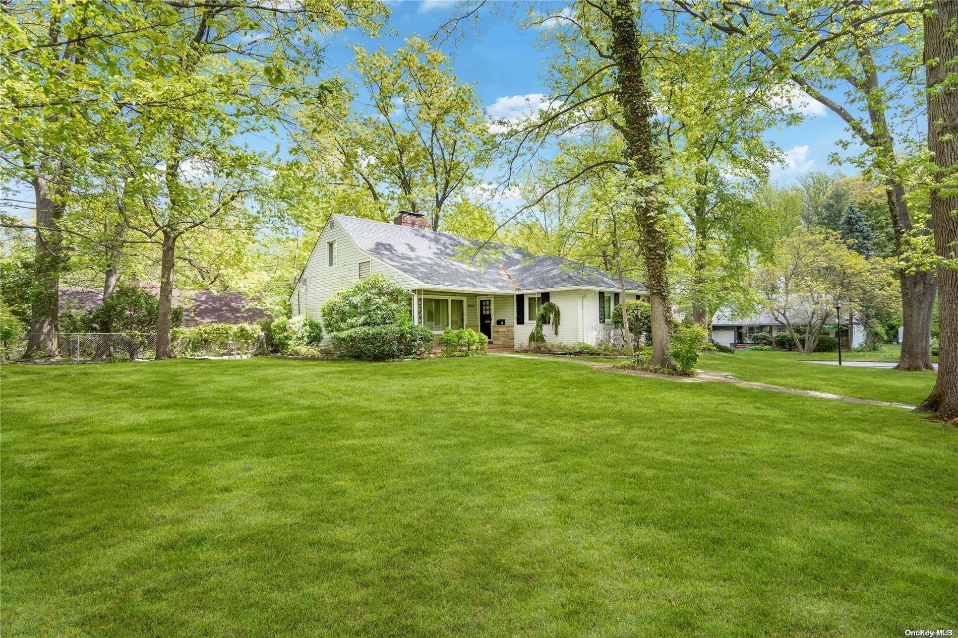 31 Shadow Lane Great Neck, NY 11021 - Photo 1 of 1 a front view of a house with a garden