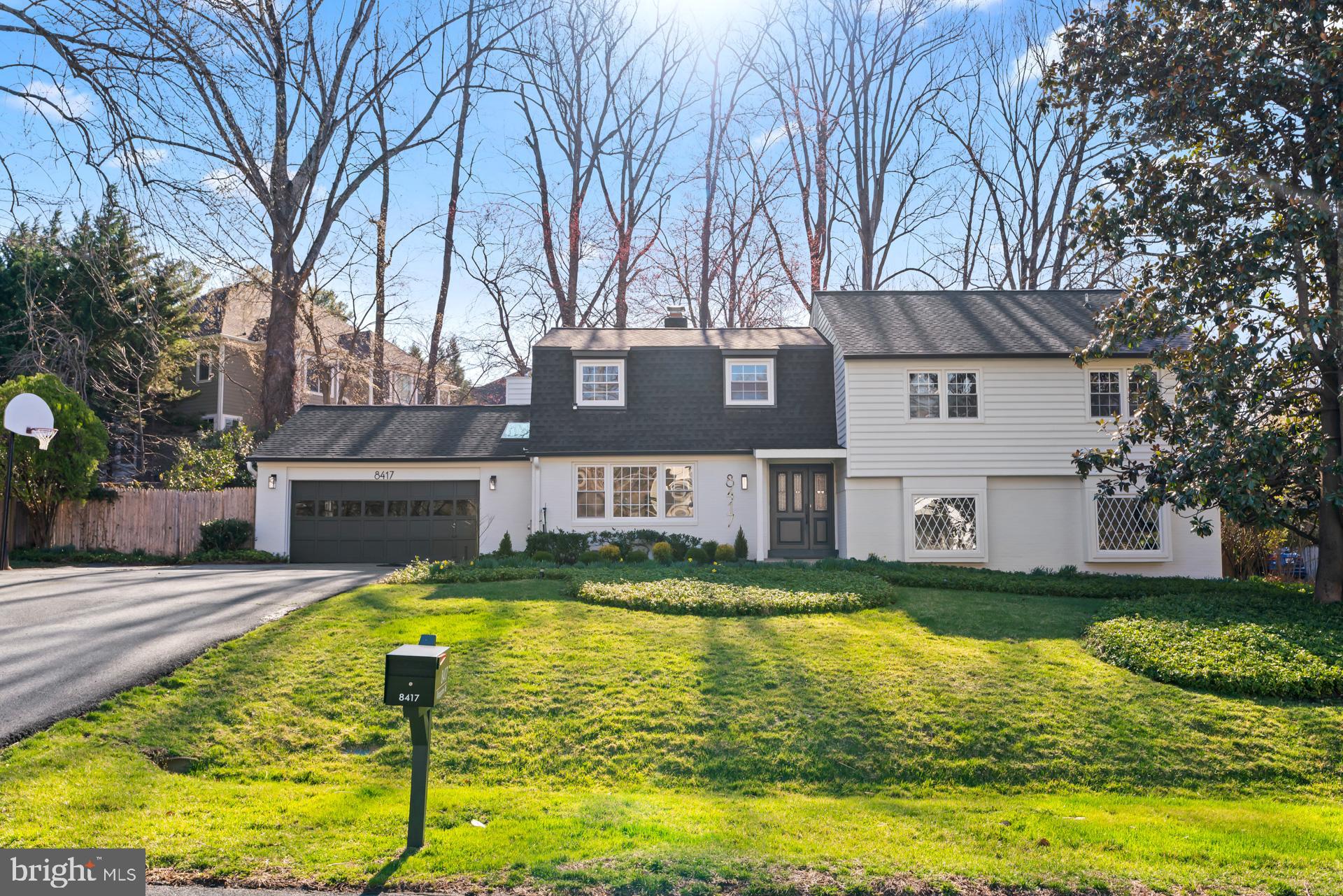 a view of a swimming pool with a house