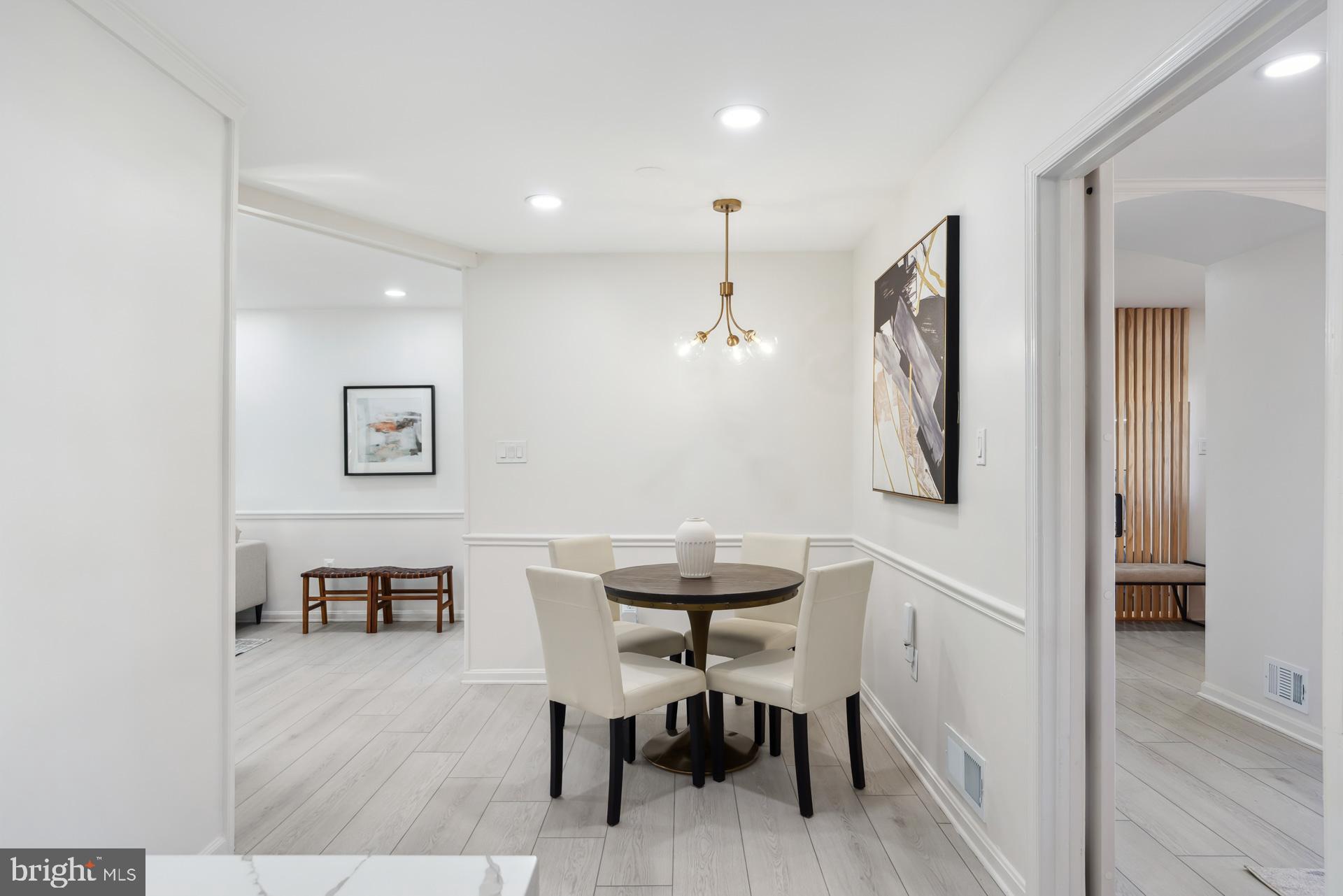 8417 Kingsgate Road Potomac, MD 20854 - Photo 15 of 61 a view of a dining room with furniture