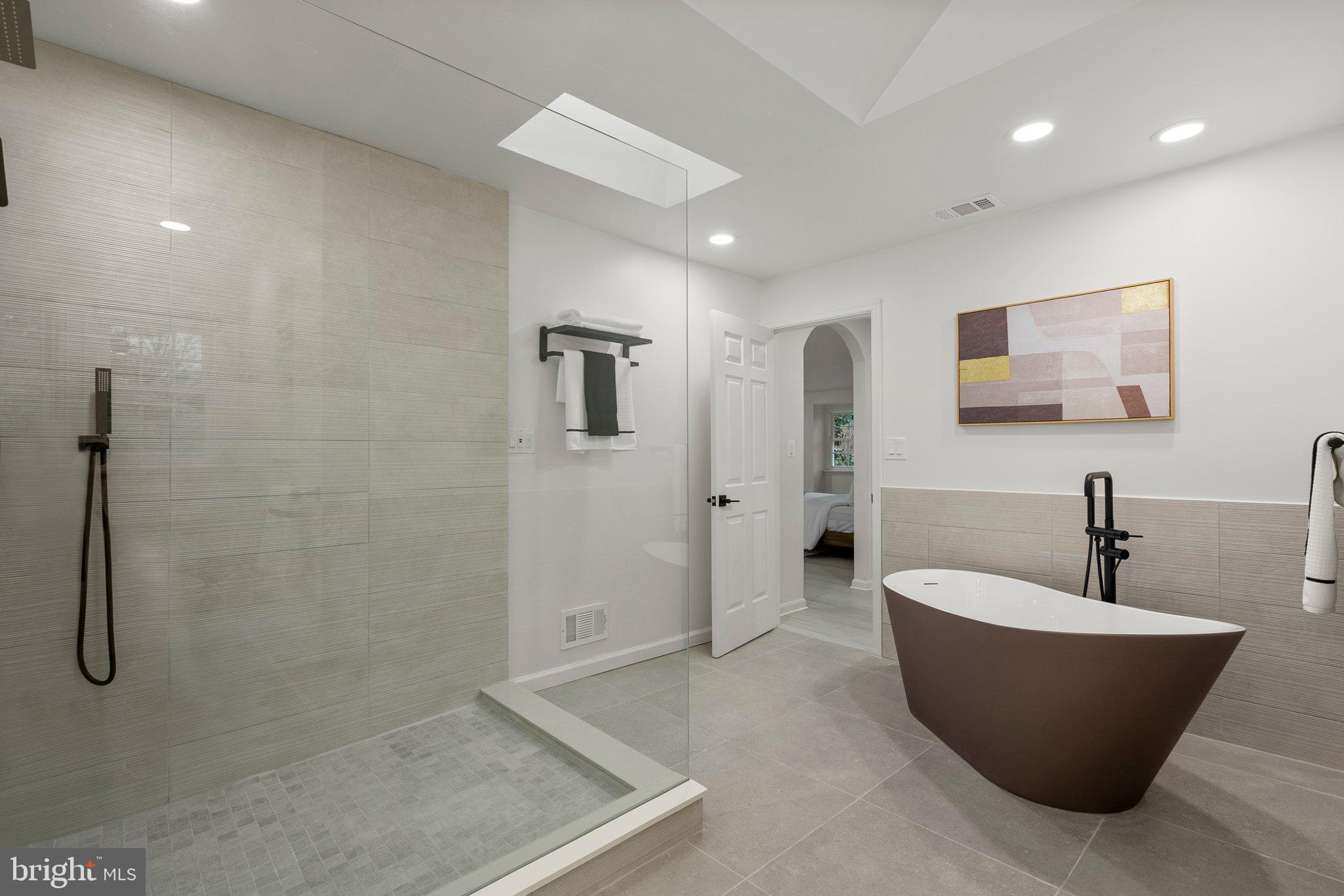 8417 Kingsgate Road Potomac, MD 20854 - Photo 46 of 61 a large room with a bathtub