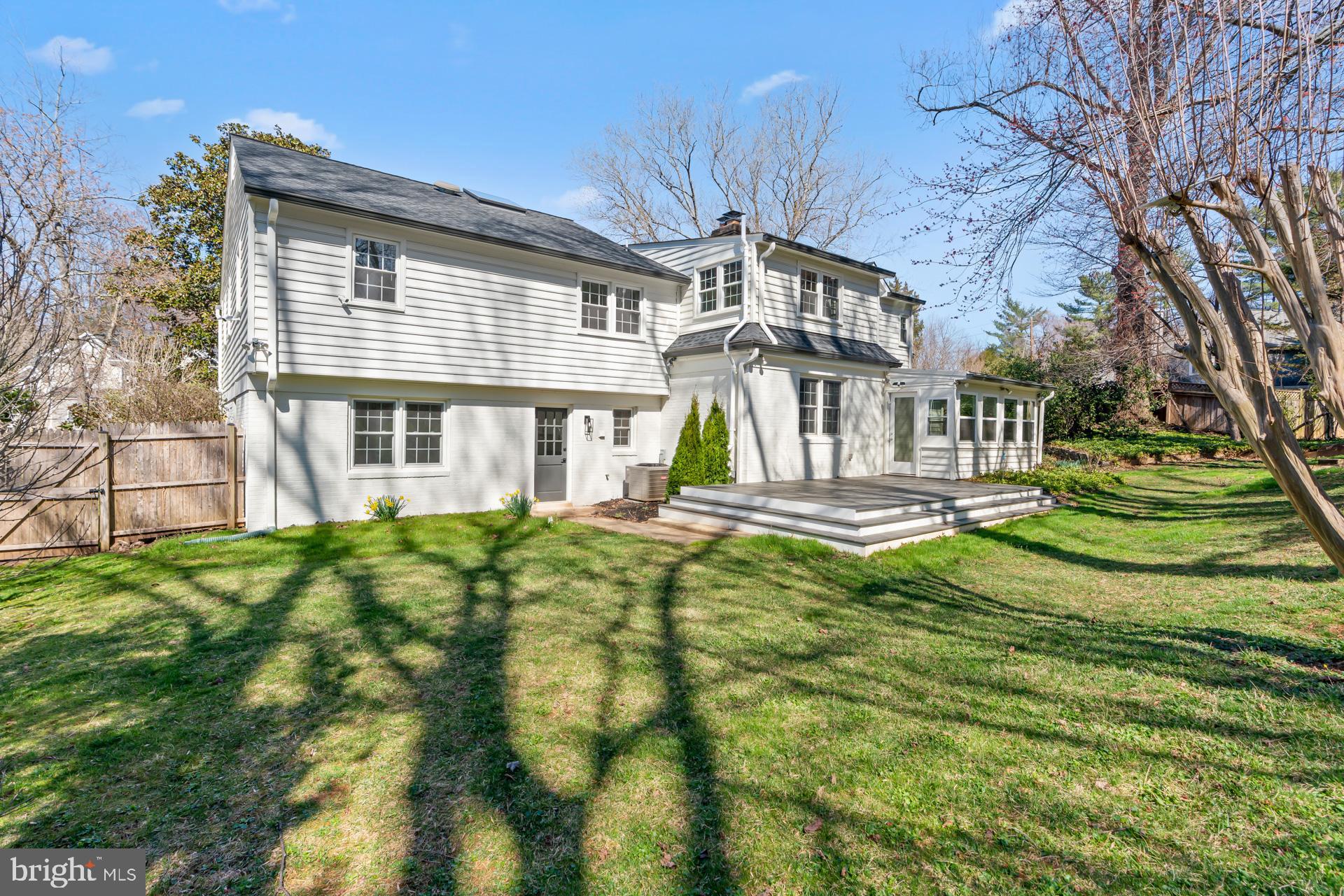8417 Kingsgate Road Potomac, MD 20854 - Photo 59 of 61 a front view of a house with a yard