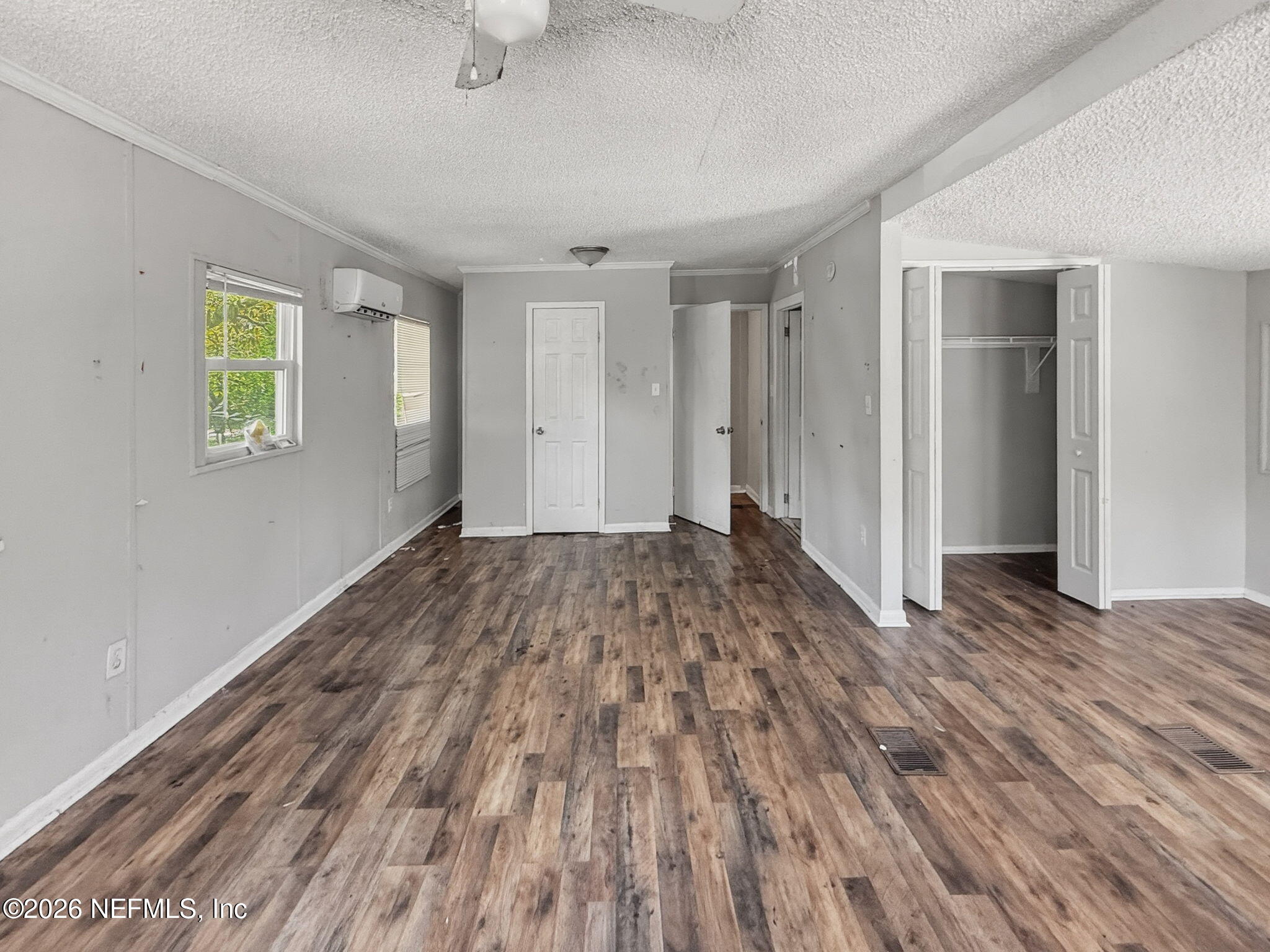 326 Cahoon Road South Jacksonville, FL 32220 - Photo 17 of 34 a view of a room with wooden floor and window