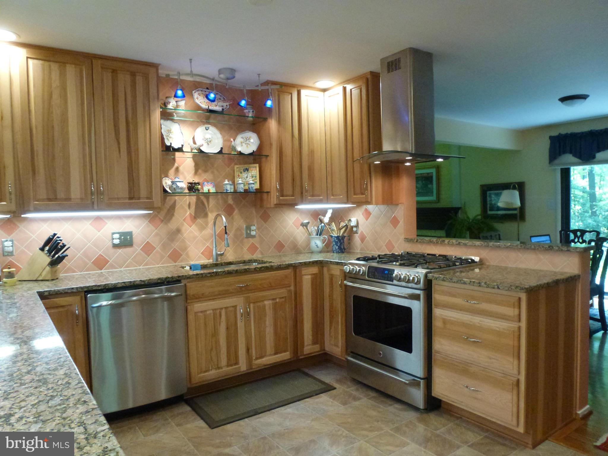 Kitchen features granite counters.