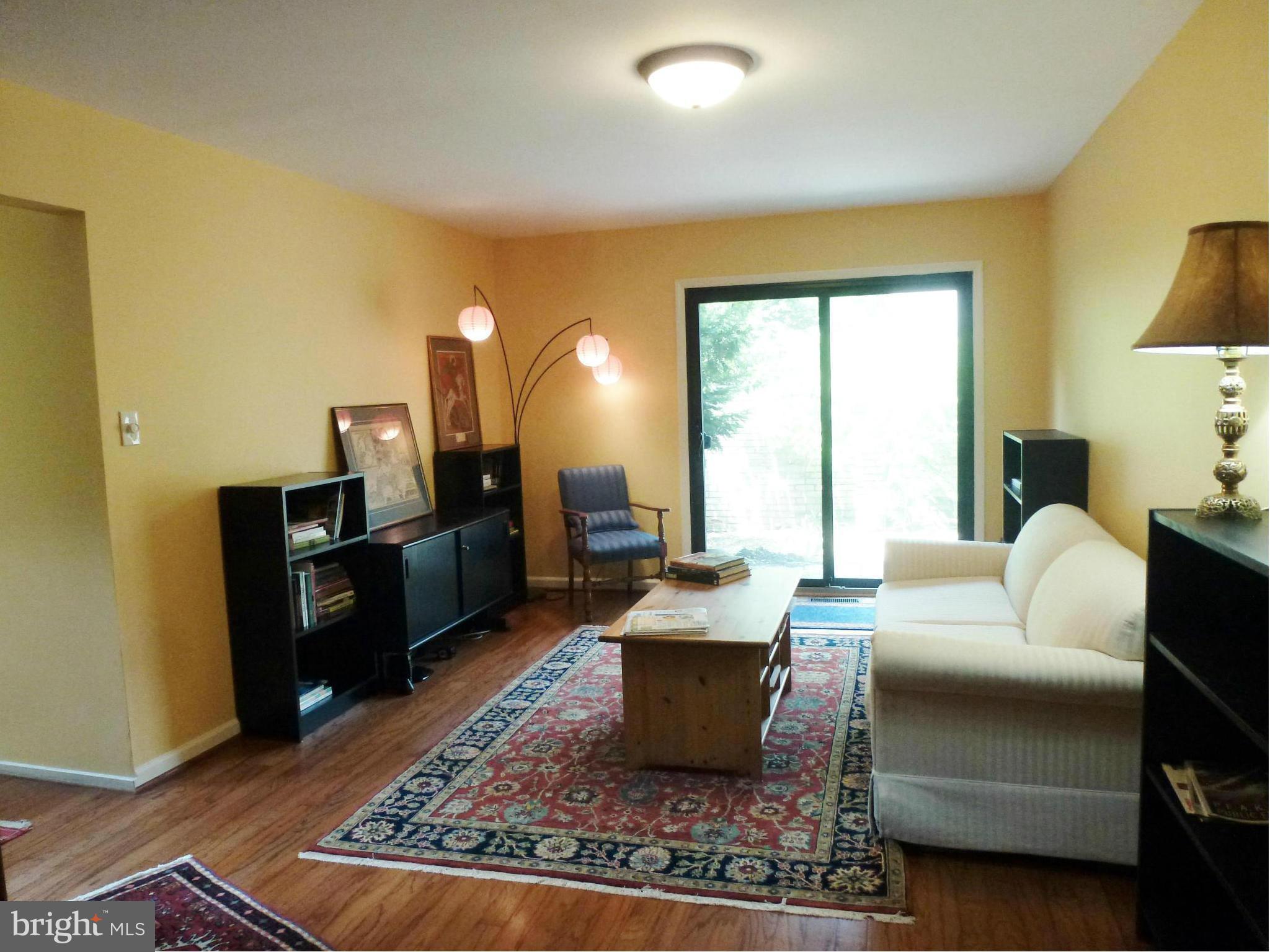 12132 Quorn Lane Reston, VA 20191 - Photo 15 of 30 Living Room w/ High Efficiency Sliding Doors.