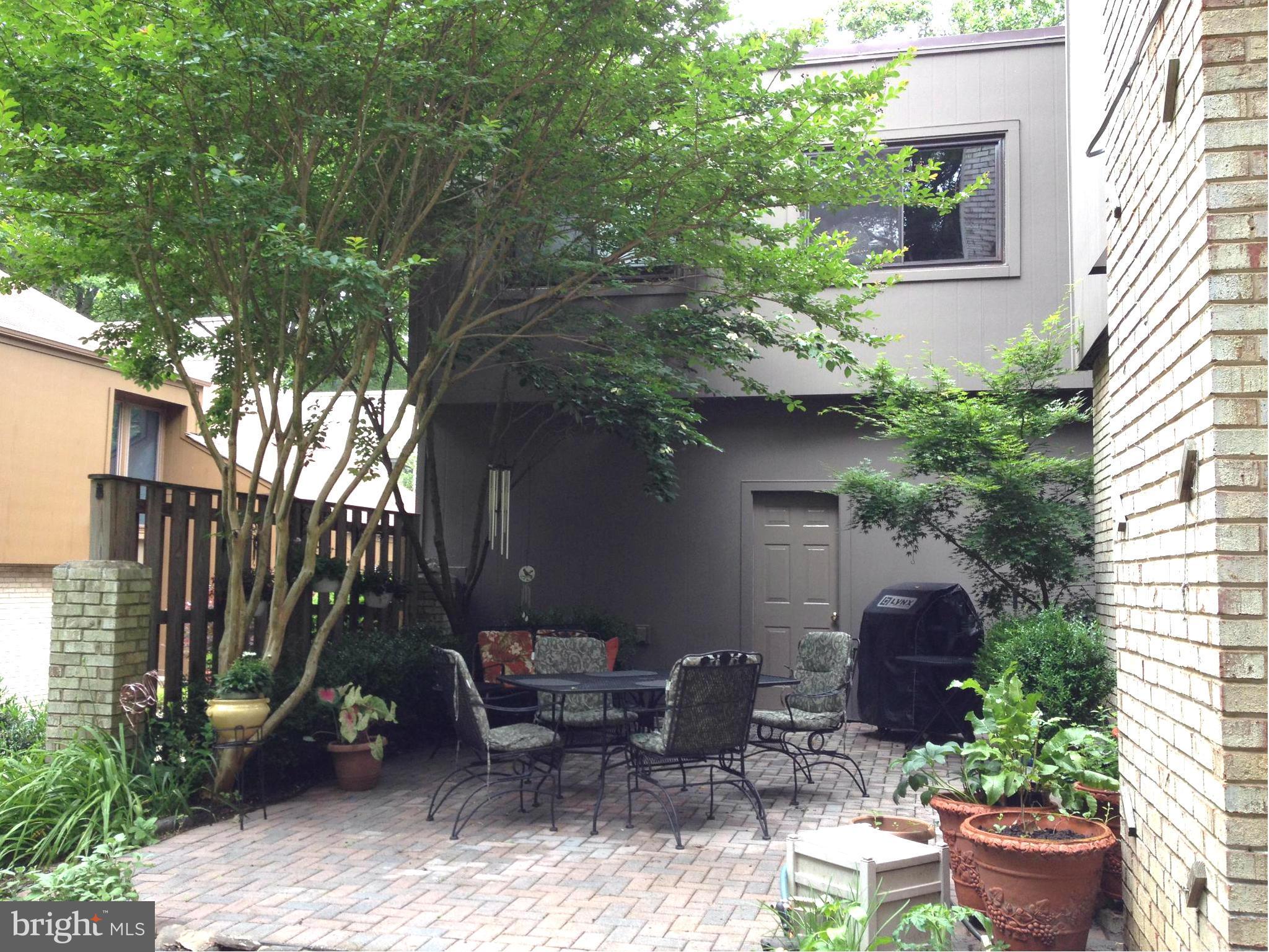 12132 Quorn Lane Reston, VA 20191 - Photo 26 of 30 Private paver patio is off the dining room.