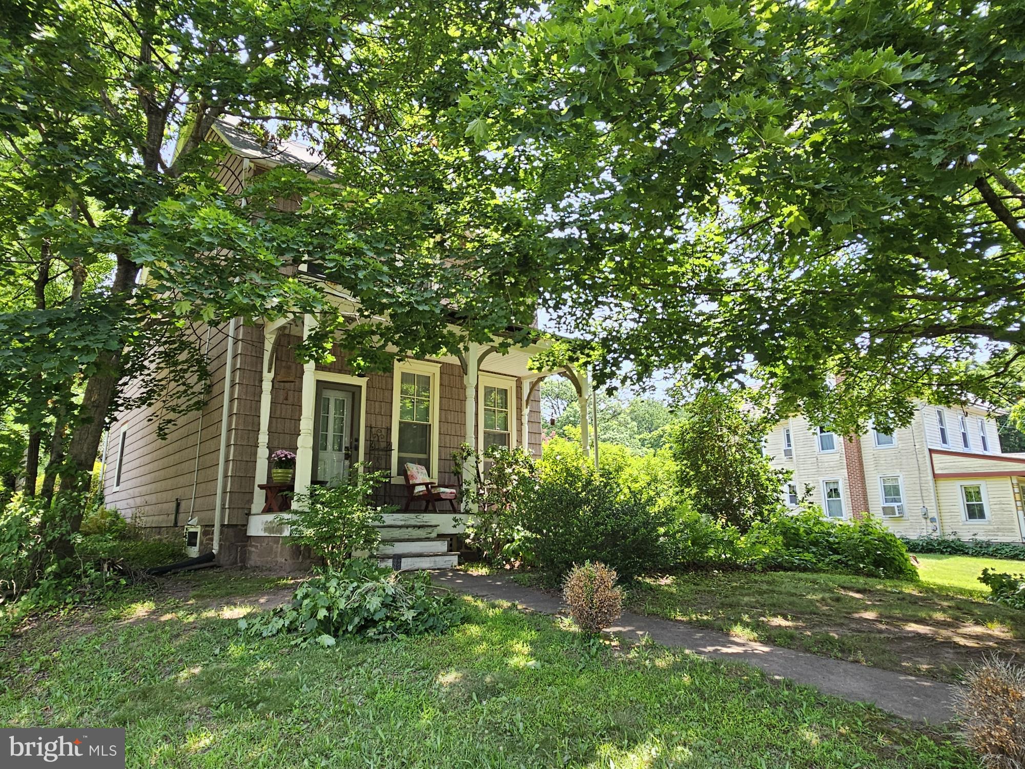 9039 Easton Road Ottsville, PA 18942 - Photo 56 of 61 a front view of a house with a yard and tree s
