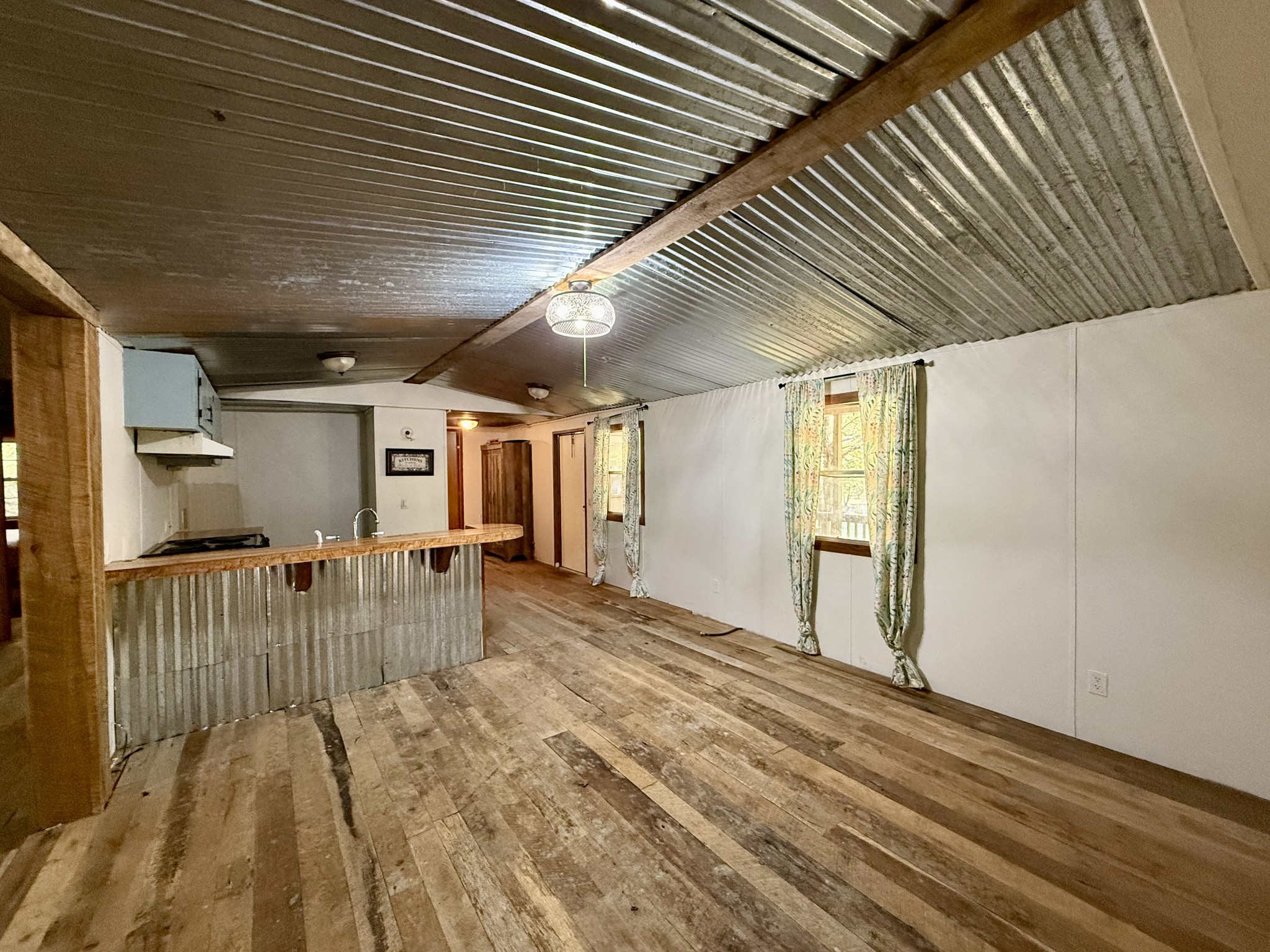 135 Haylee Road Waverly, TN 37185 - Photo 11 of 21 a view of a patio with a table and chairs