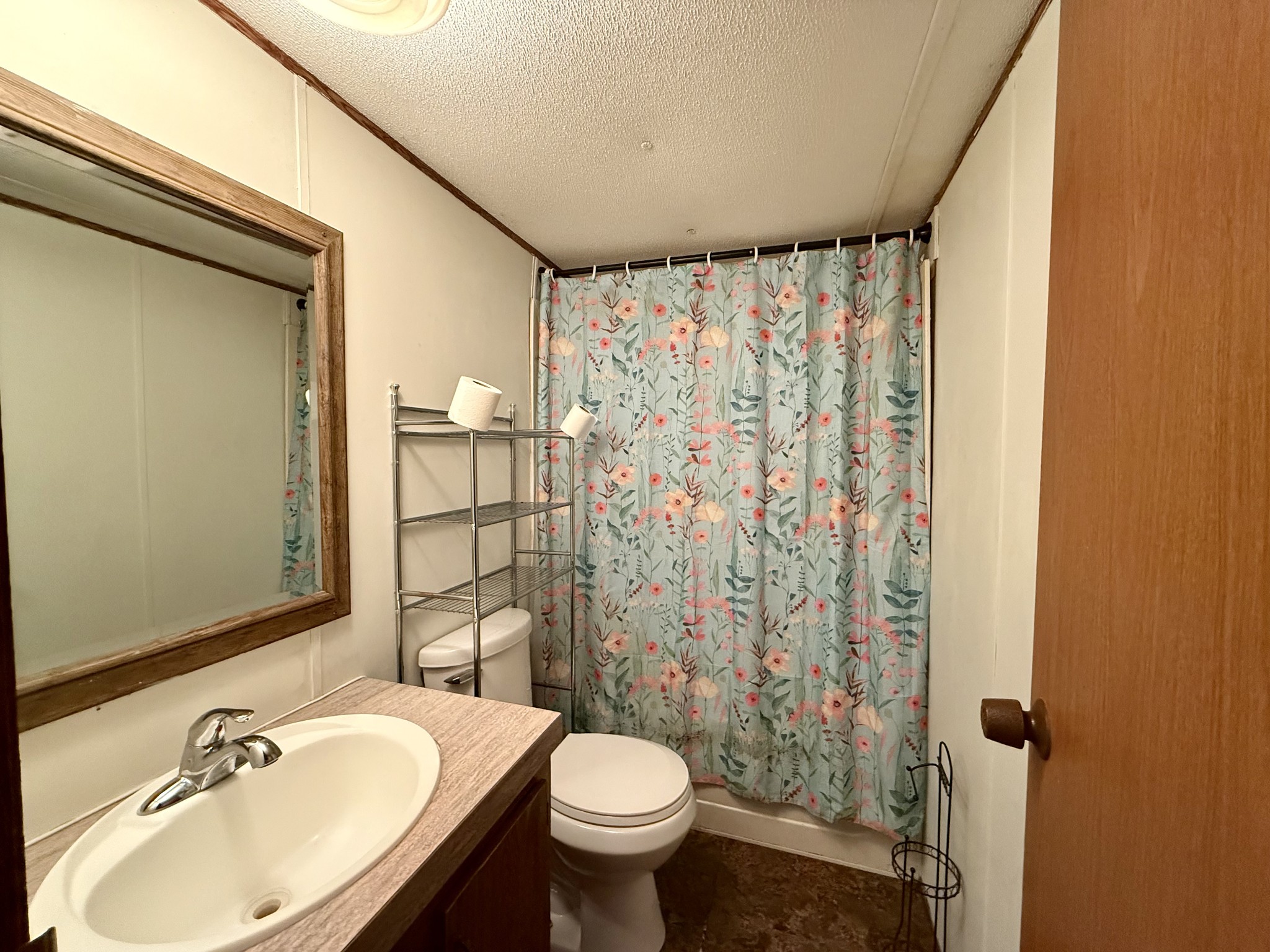 135 Haylee Road Waverly, TN 37185 - Photo 15 of 21 a bathroom with a sink toilet and shower