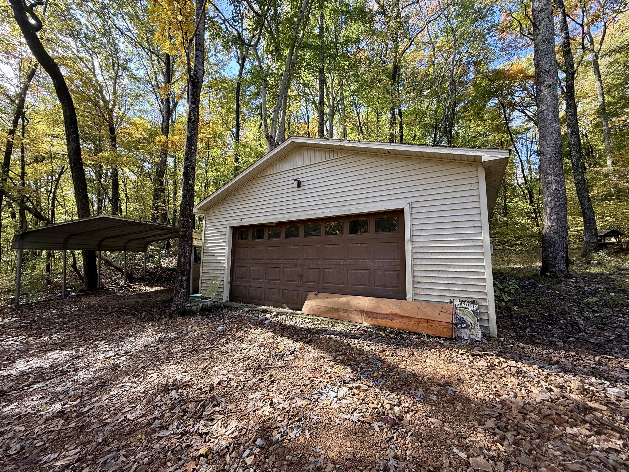 135 Haylee Road Waverly, TN 37185 - Photo 6 of 21 a front view of a house with a yard
