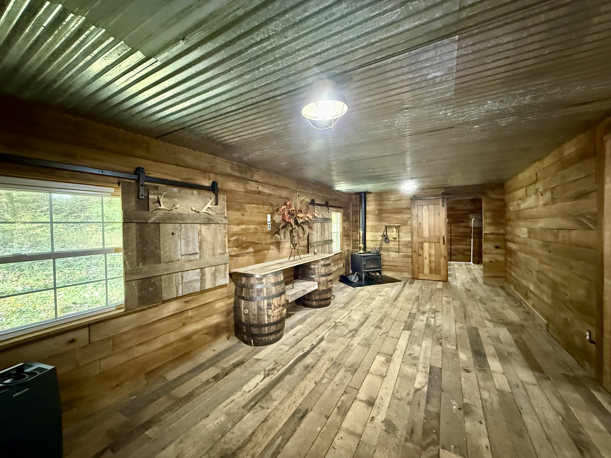 135 Haylee Road Waverly, TN 37185 - Photo 8 of 21 a view of a room with gym equipment