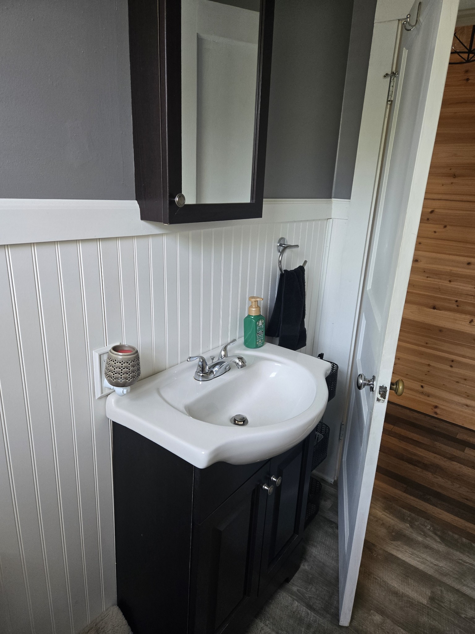 1605 New Dry Hollow Road Vanleer, TN 37181 - Photo 17 of 40 a bathroom with a sink and a mirror