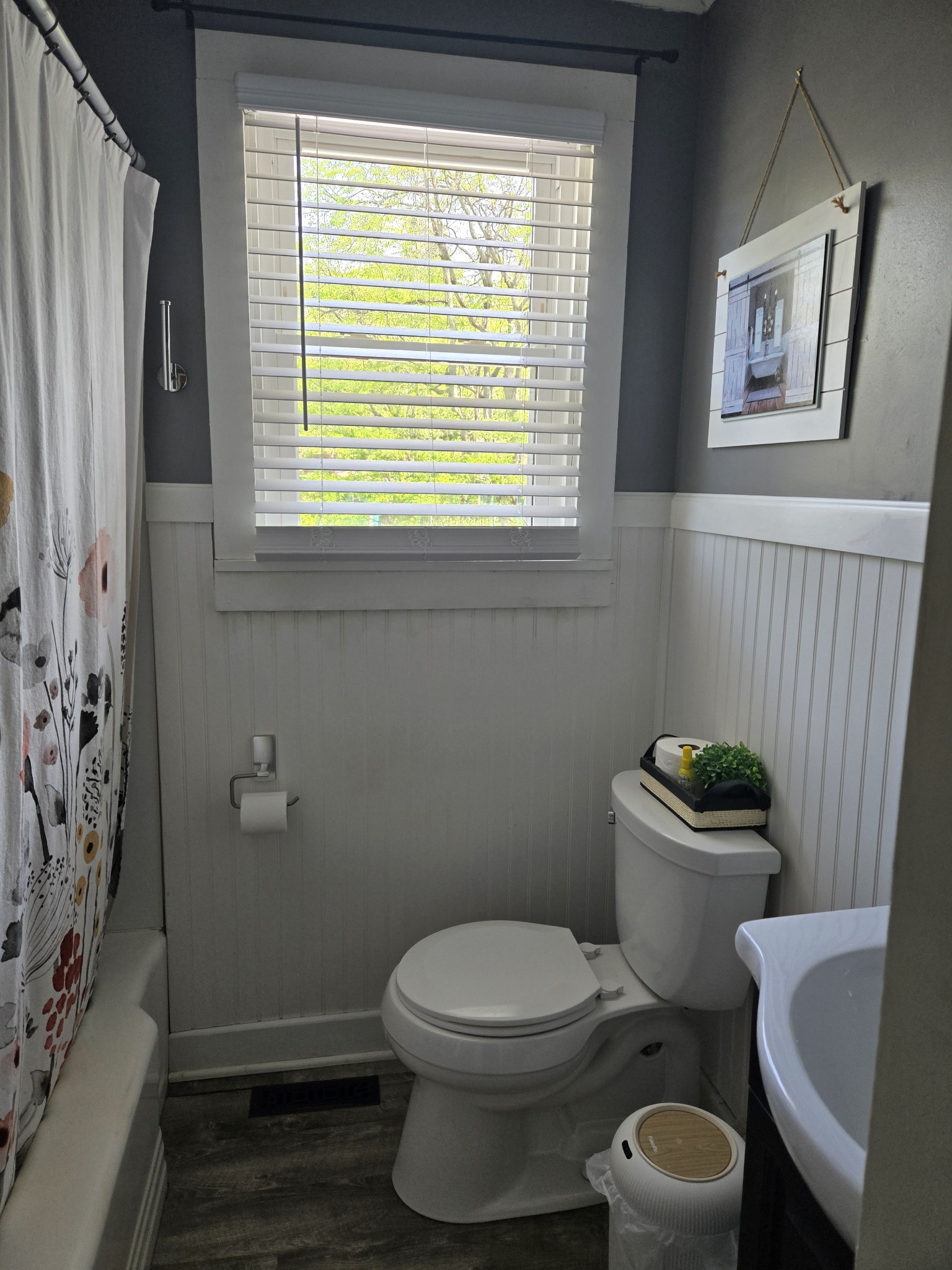 1605 New Dry Hollow Road Vanleer, TN 37181 - Photo 18 of 40 a bathroom with a toilet a sink and a window