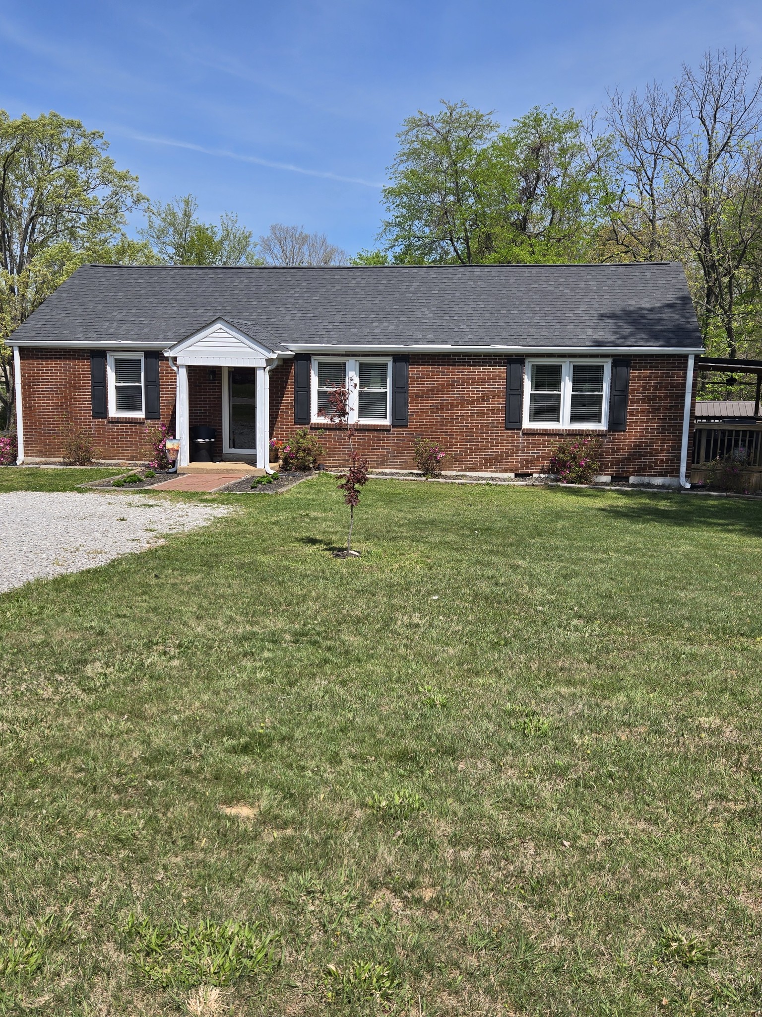 1605 New Dry Hollow Road Vanleer, TN 37181 - Photo 2 of 40 front view of a house with a yard