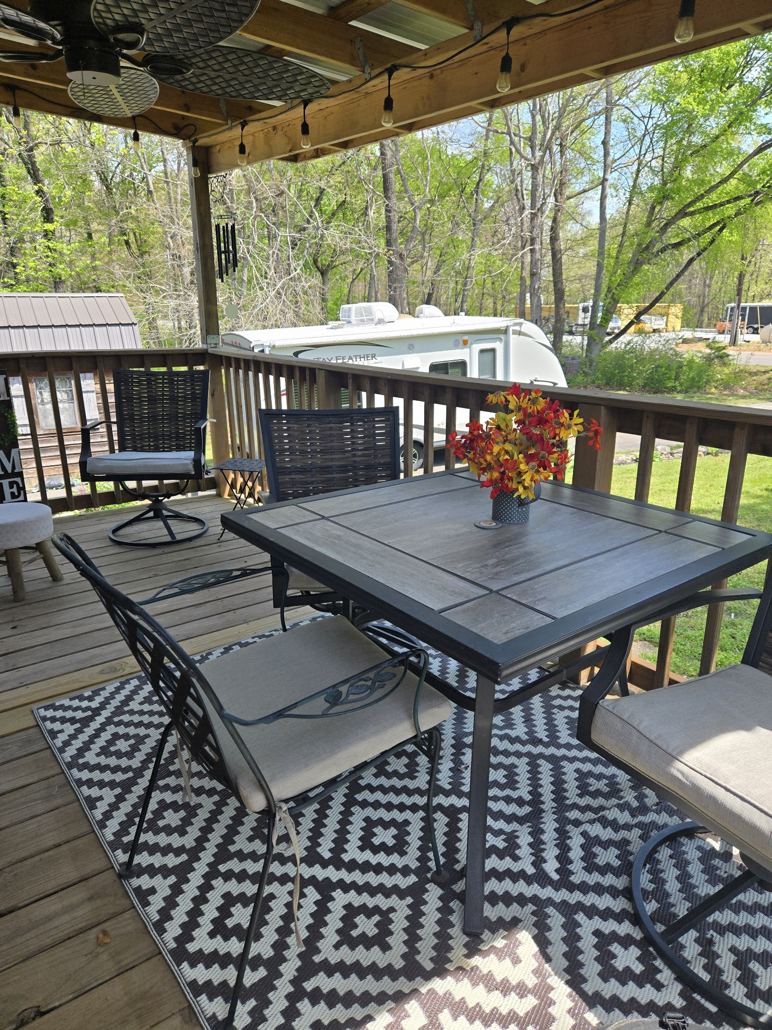 1605 New Dry Hollow Road Vanleer, TN 37181 - Photo 28 of 40 a view of a patio with table and chairs