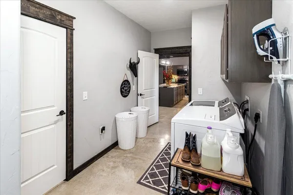 a bedroom with a bed and a couch
