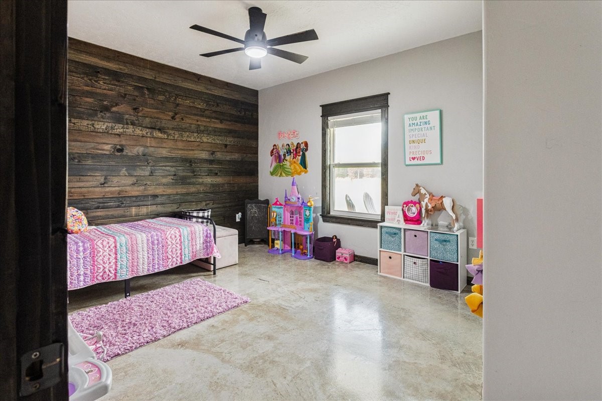 2032 Pahal Road Huntington, TX 75949 - Photo 25 of 45 a bedroom with a bed and a window