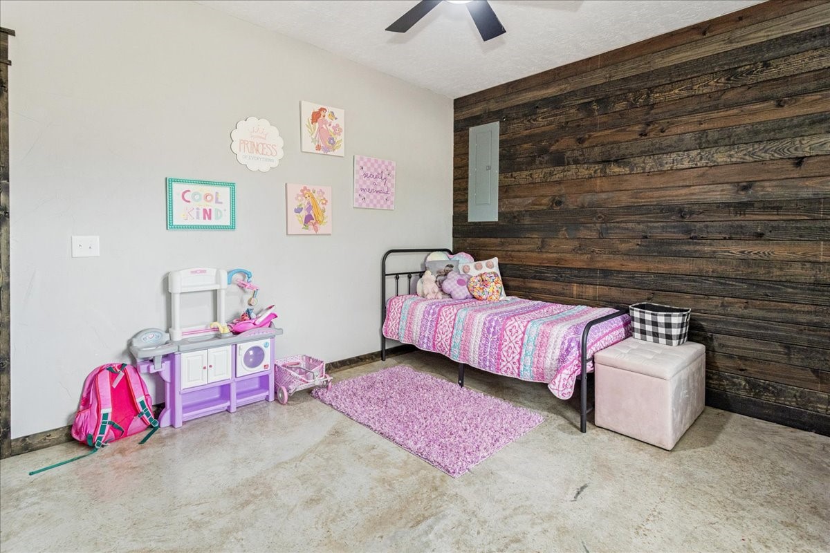 2032 Pahal Road Huntington, TX 75949 - Photo 26 of 45 a bedroom with a bed and a couch