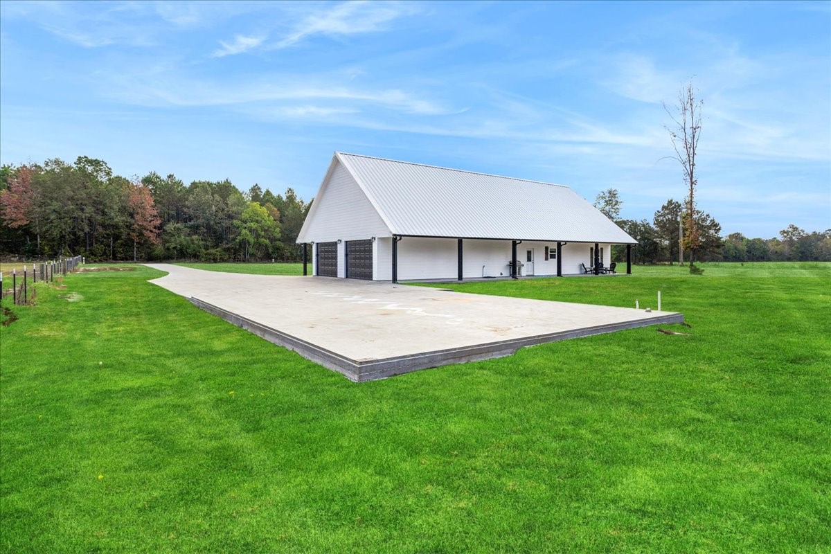 2032 Pahal Road Huntington, TX 75949 - Photo 42 of 45 a view of house with a big yard