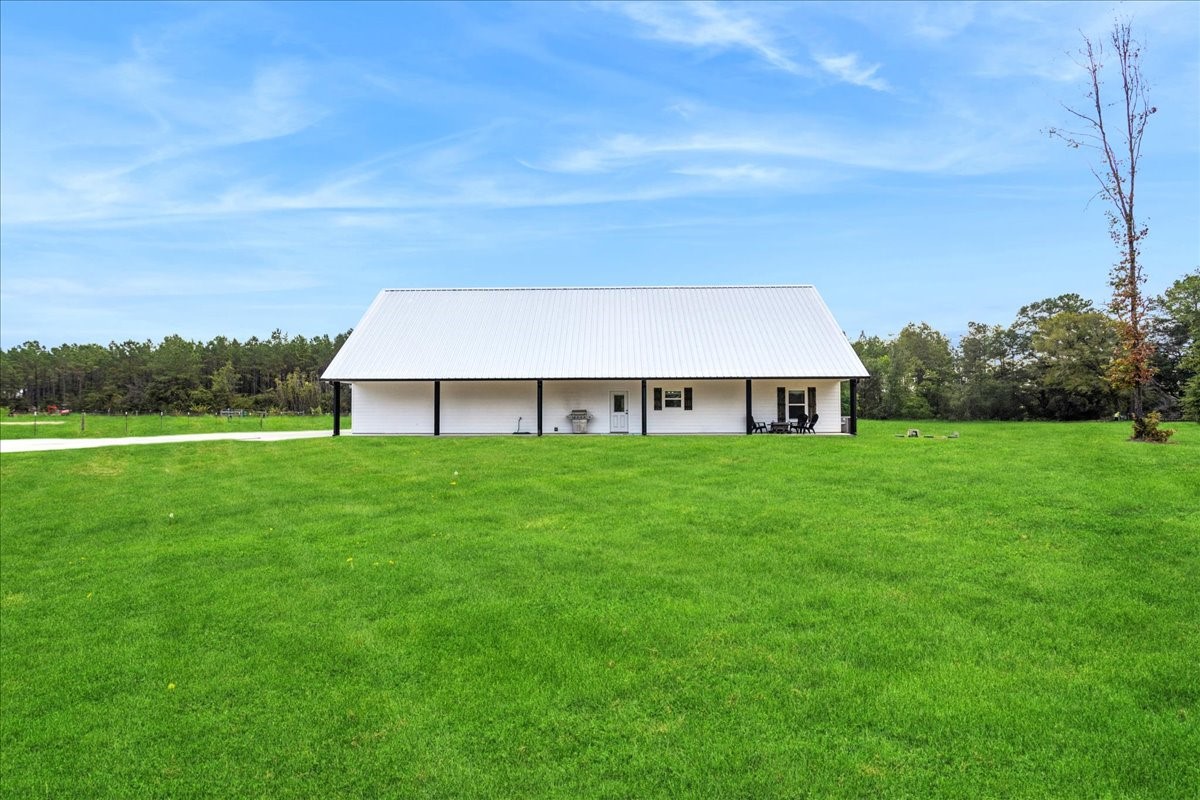 2032 Pahal Road Huntington, TX 75949 - Photo 43 of 45 a view of a house with a yard