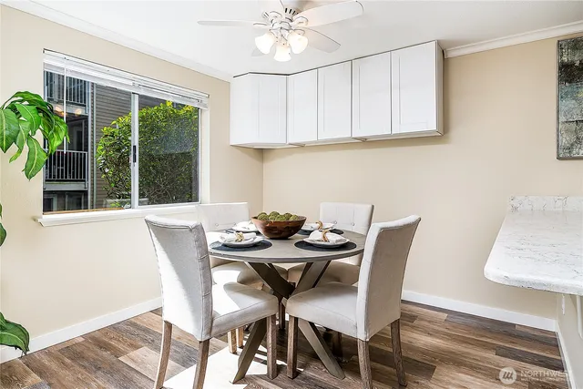 a view of a dining room with furniture window and outside view