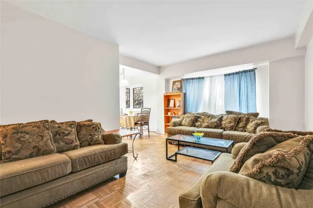 a living room with furniture and a couch