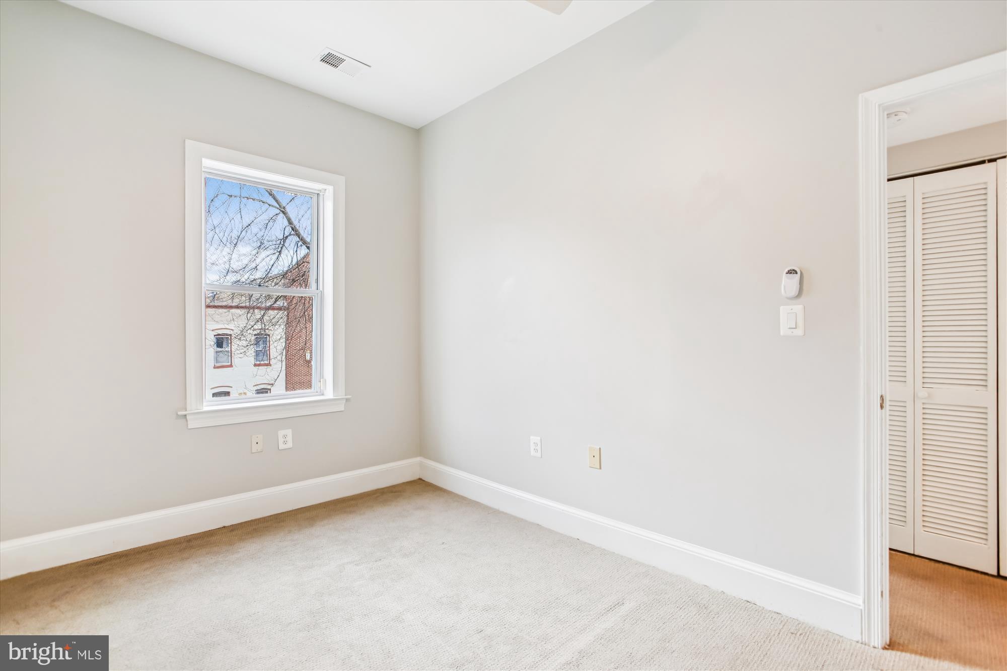 1610 4th Street Northwest Washington, DC 20001 - Photo 21 of 47 an empty room with a window