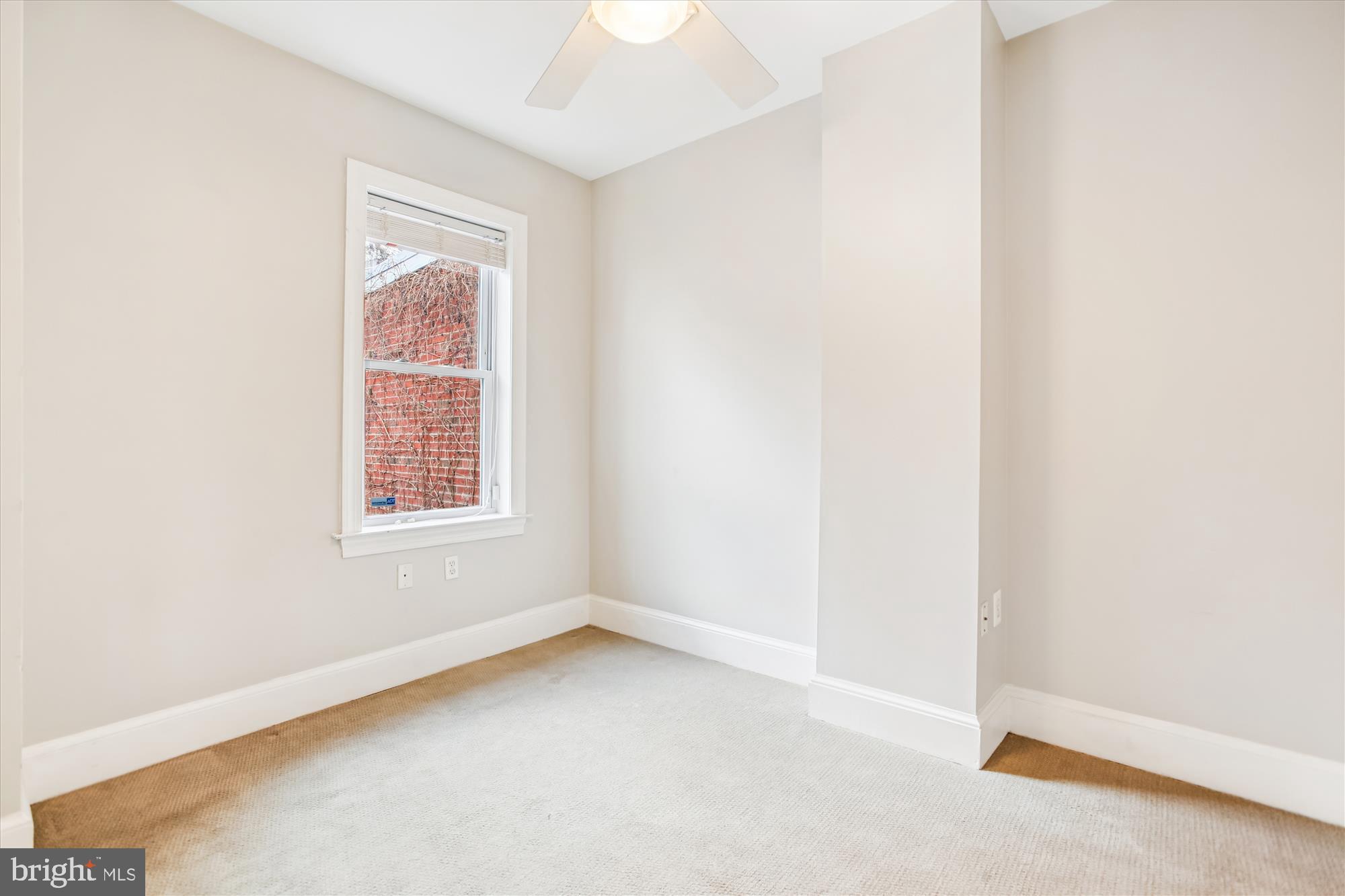 1610 4th Street Northwest Washington, DC 20001 - Photo 24 of 47 an empty room with a window