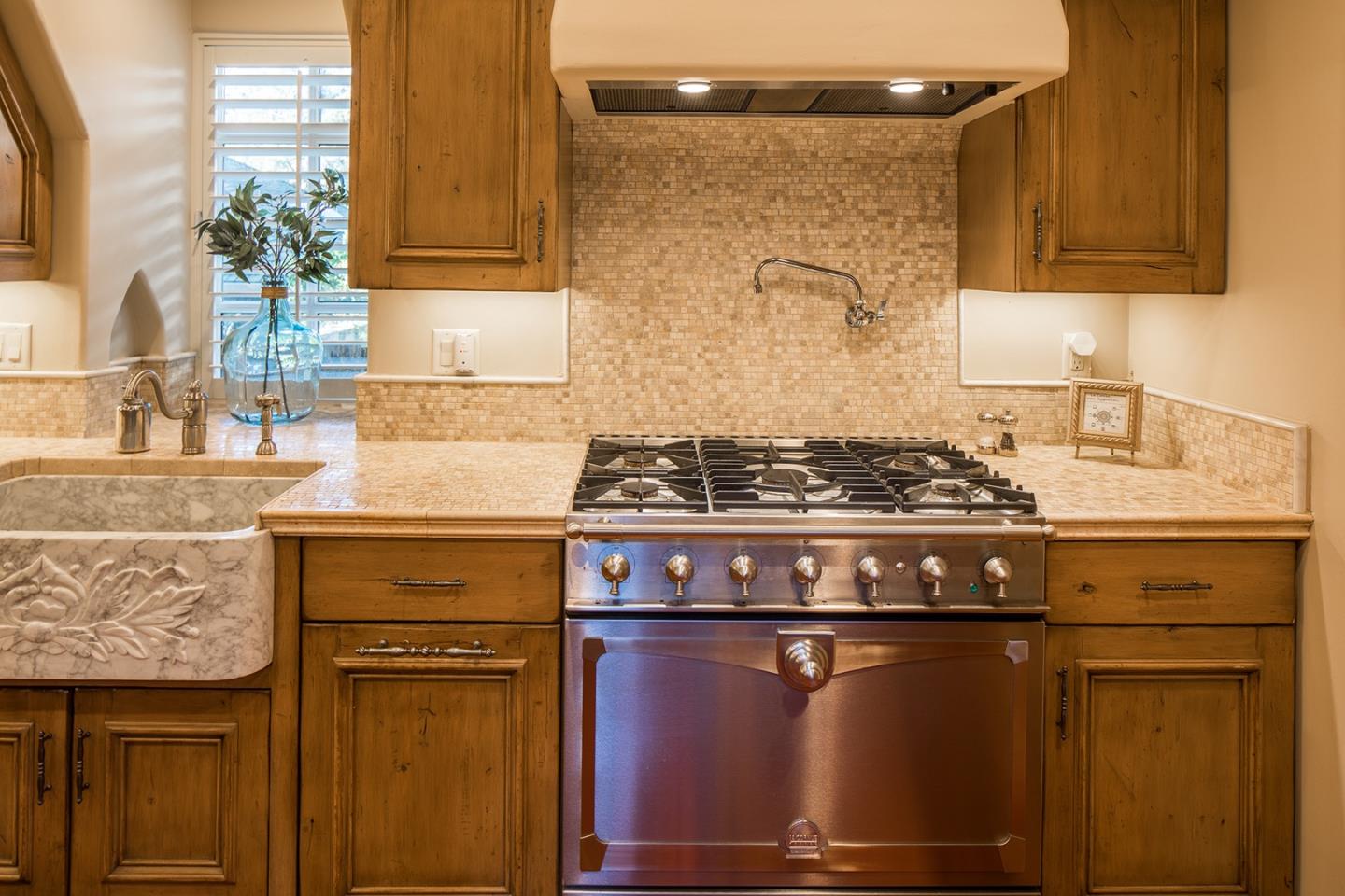 0 Seventh Ave 2 Carmel, CA 93923 - Photo 12 of 23 a kitchen with granite countertop a stove and cabinets