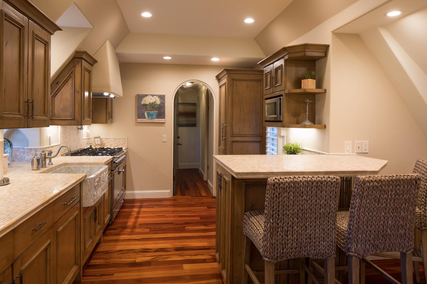 0 Seventh Ave 2 Carmel, CA 93923 - Photo 13 of 23 a kitchen with stainless steel appliances granite countertop a kitchen island a sink a stove and a refrigerator
