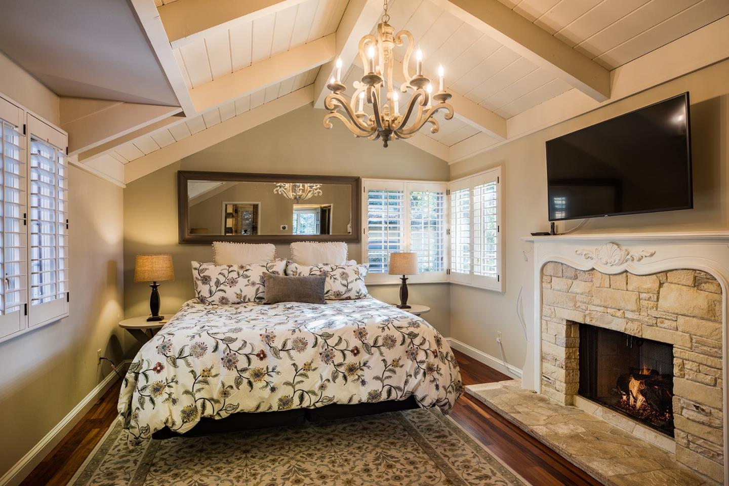 0 Seventh Ave 2 Carmel, CA 93923 - Photo 15 of 23 a bedroom with a bed and a flat screen tv