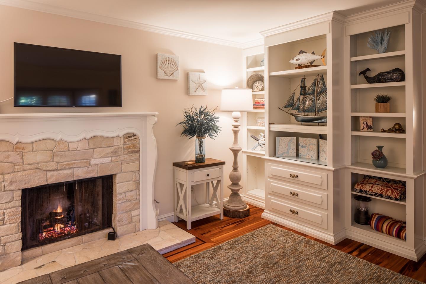 0 Seventh Ave 2 Carmel, CA 93923 - Photo 9 of 23 a living room with furniture and a fireplace