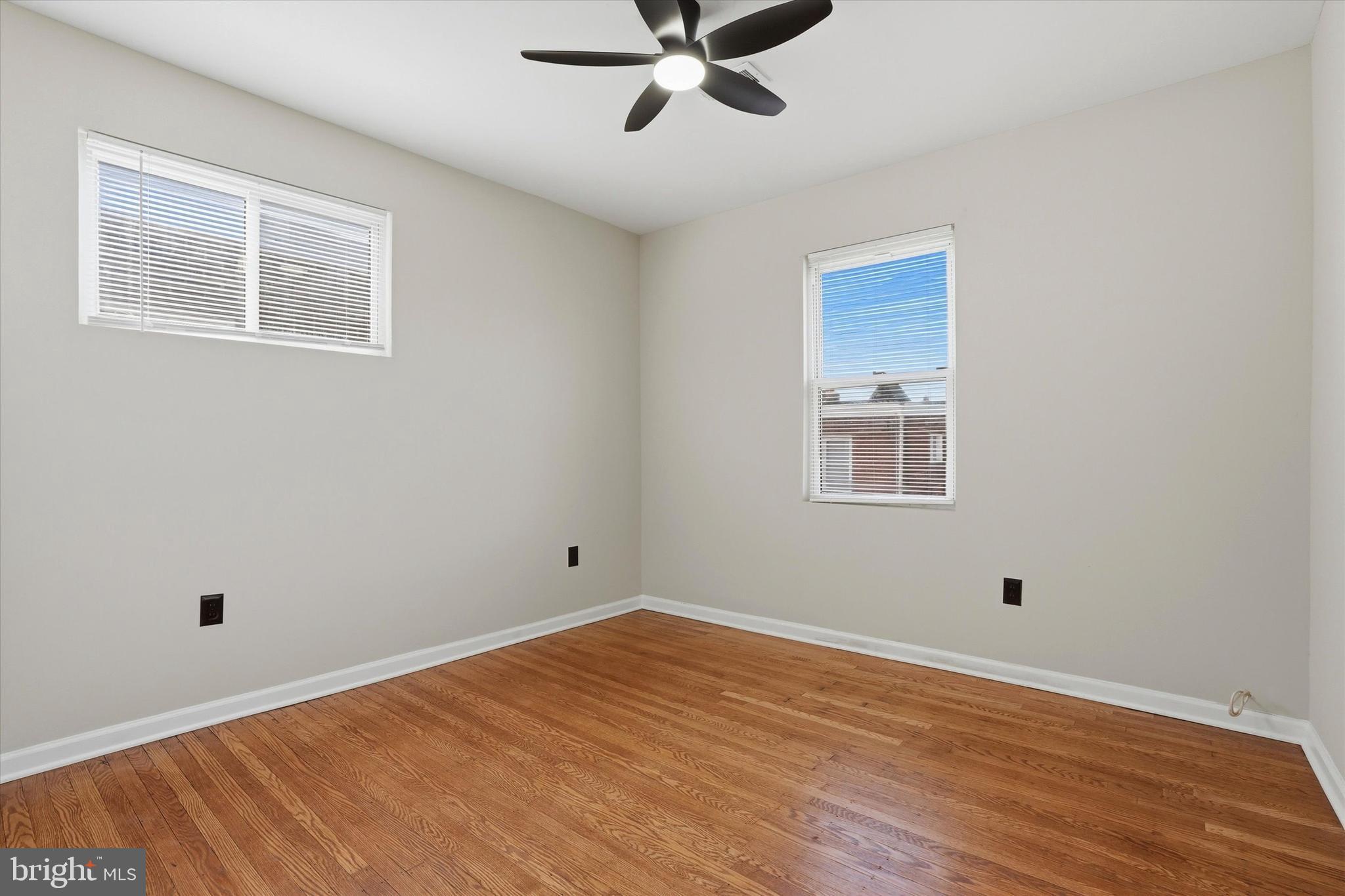 6258 Magnolia Street Philadelphia, PA 19144 - Photo 19 of 25 a view of empty room with wooden floor