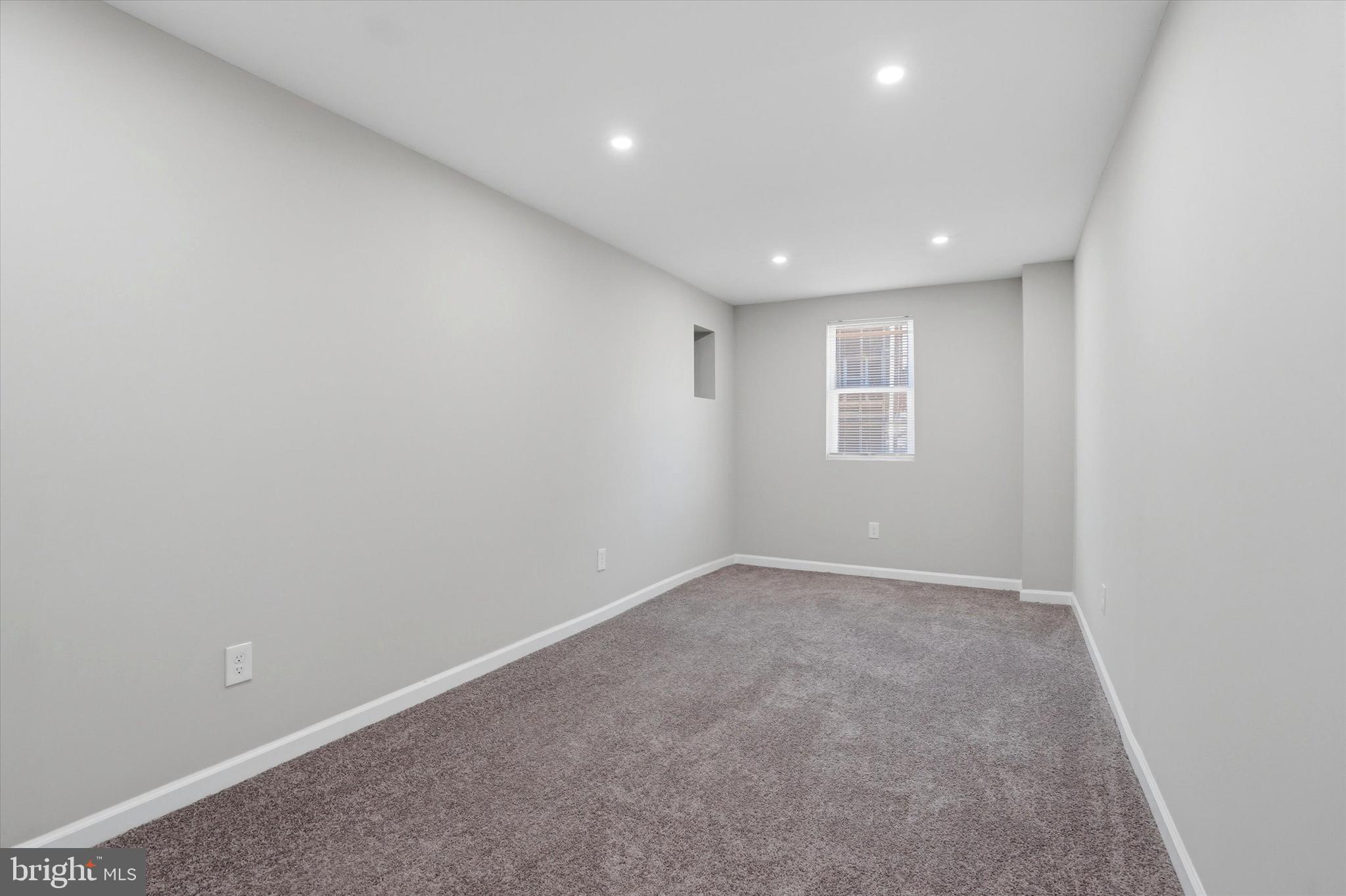 6258 Magnolia Street Philadelphia, PA 19144 - Photo 24 of 25 an empty room with windows