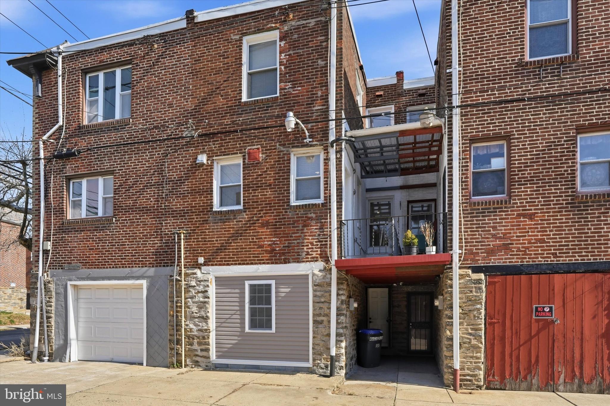 6258 Magnolia Street Philadelphia, PA 19144 - Photo 25 of 25 a view of a brick building with a large windows