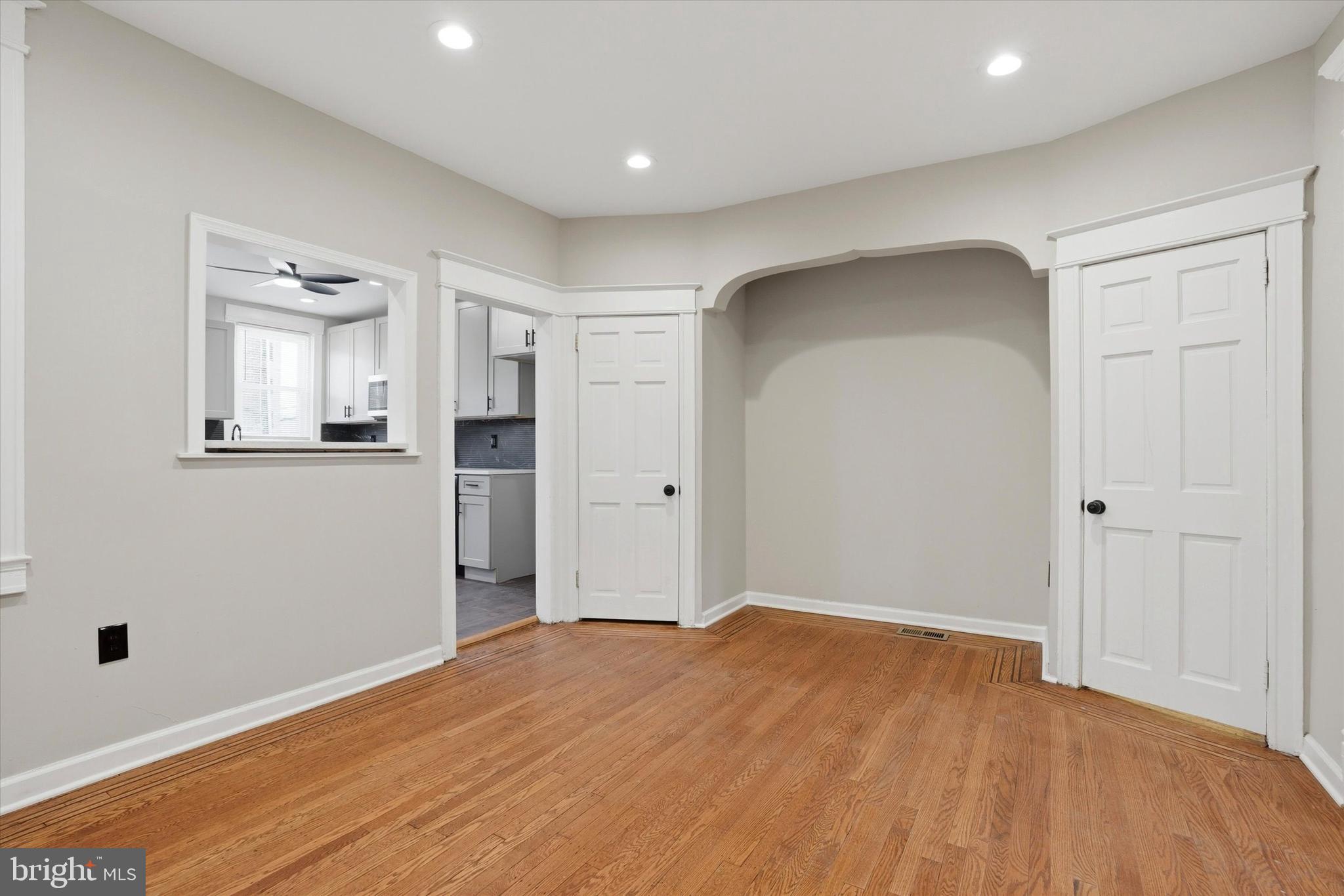 6258 Magnolia Street Philadelphia, PA 19144 - Photo 8 of 25 a big room with wooden floor and windows