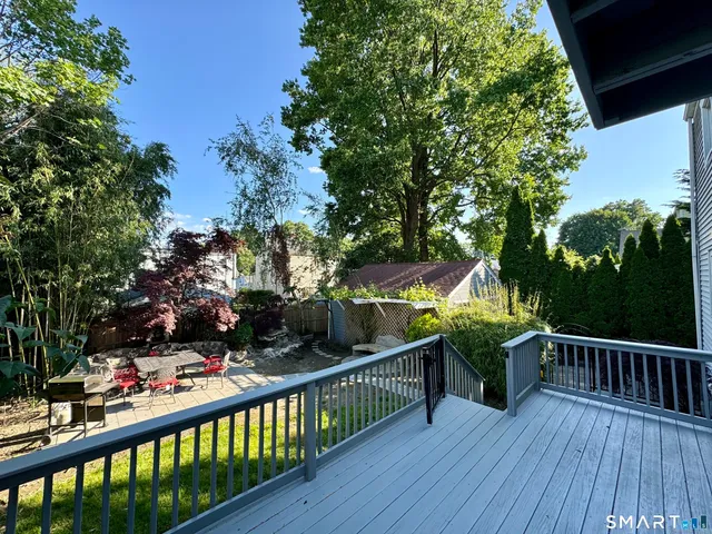 a view of street from balcony