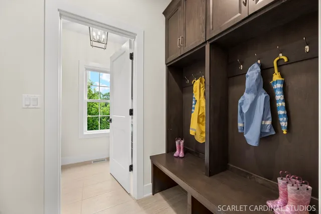 a living room with a bed and a window