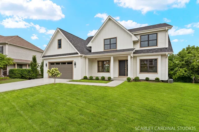 front view of a house with a yard