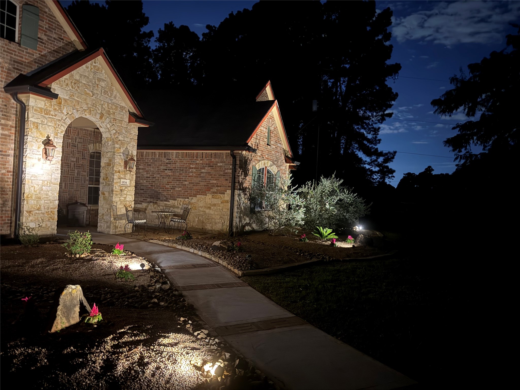 1534 Virgie Community Road Magnolia, TX 77354 - Photo 8 of 50 This amazing home is beautifully lit at night! What a treat to watch the sun go down as your home accent lights turn on!