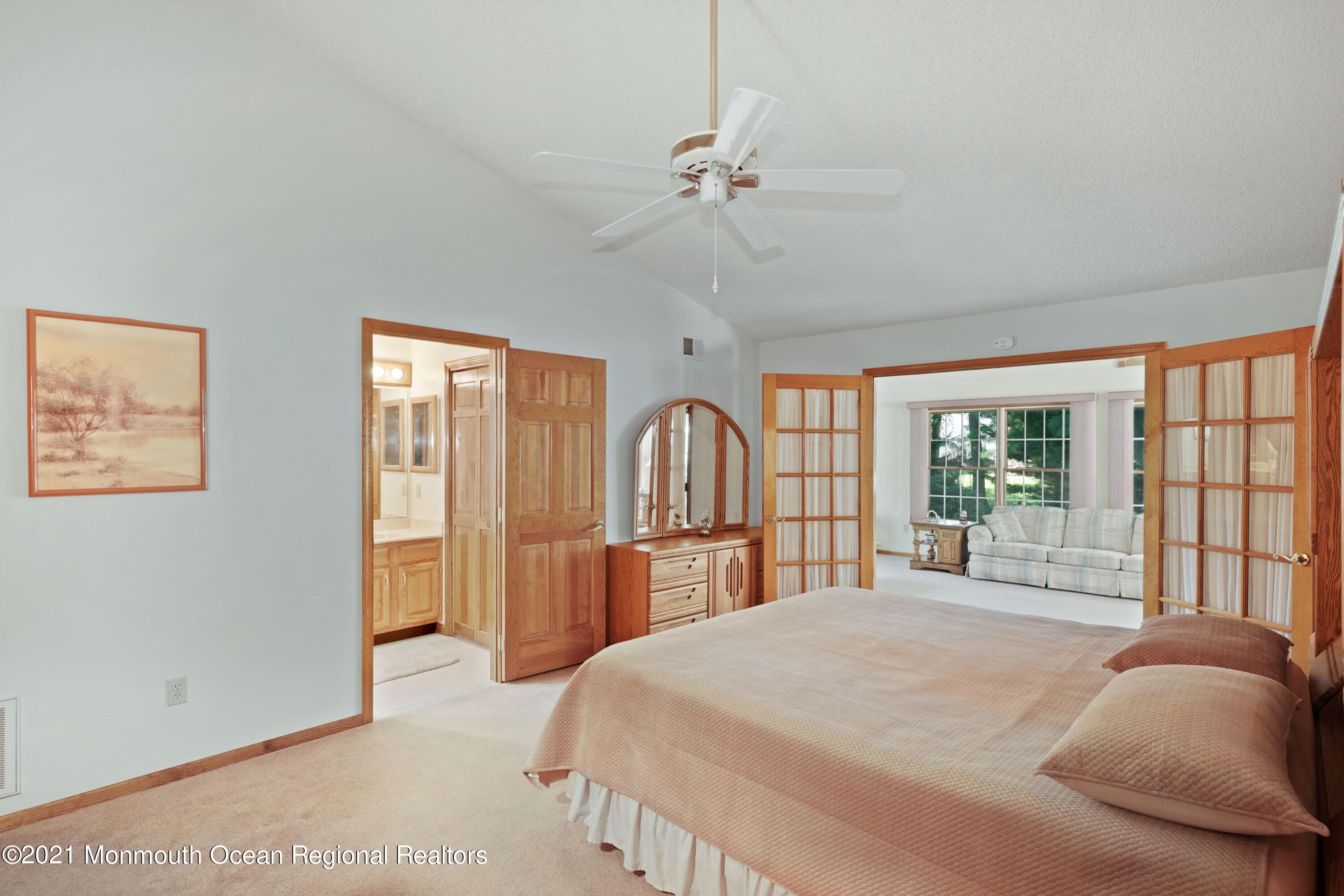 1617 Sweetbay Drive Toms River, NJ 08755 - Photo 11 of 18 a bedroom with a large bed and a large window