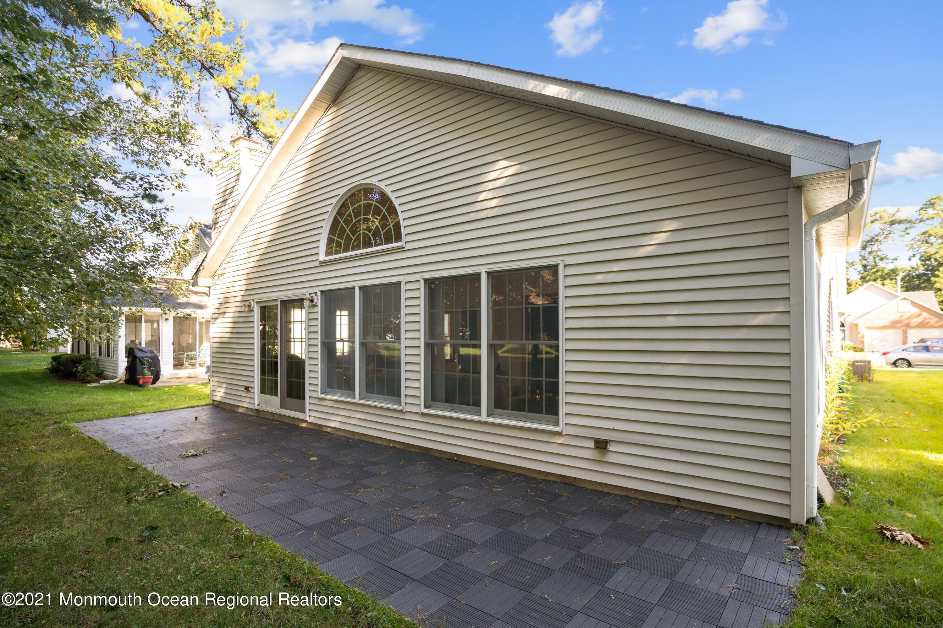 1617 Sweetbay Drive Toms River, NJ 08755 - Photo 16 of 18 a view of a house with a yard