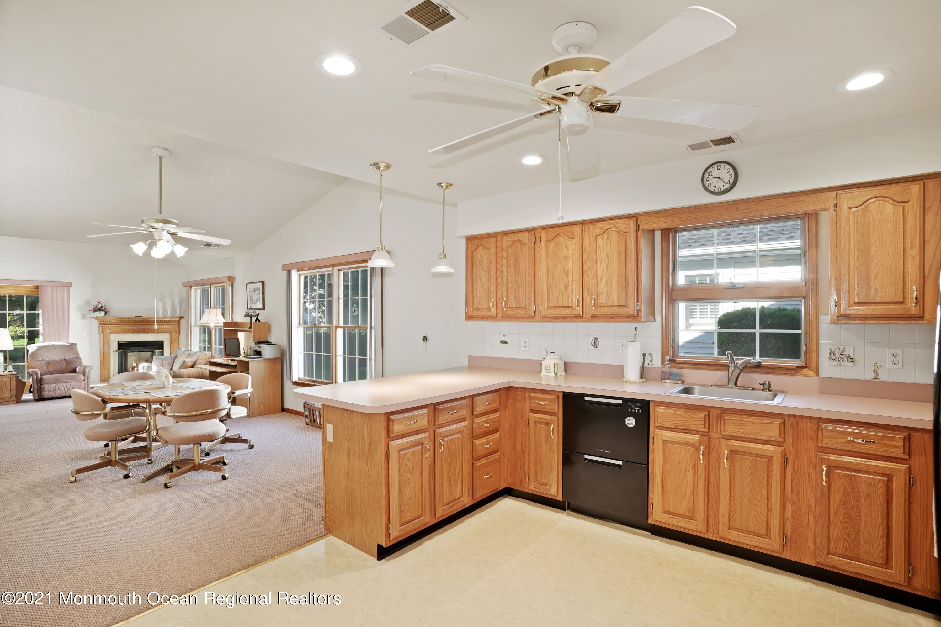1617 Sweetbay Drive Toms River, NJ 08755 - Photo 8 of 18 a large white kitchen with a large window