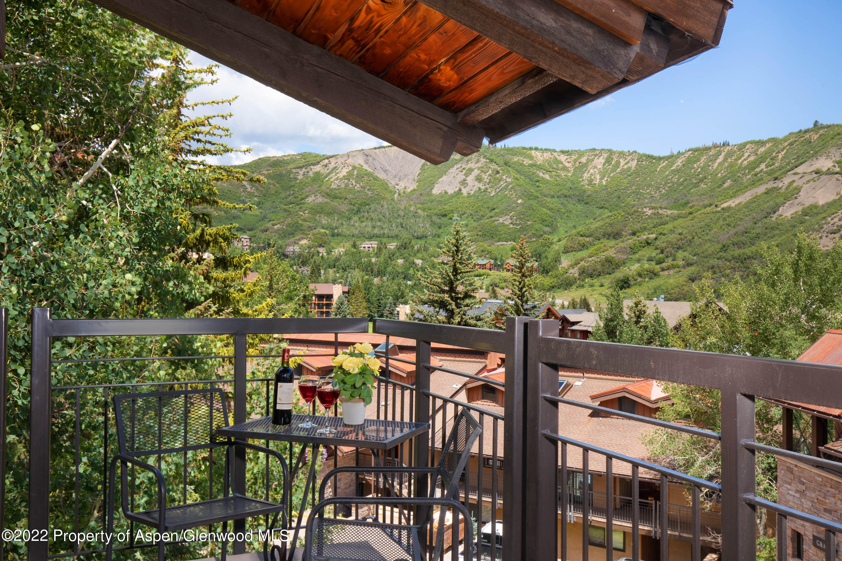 400 Wood Road, Unit 2310 Snowmass Village, CO 81615 - Photo 5 of 18 a view of a city from a balcony