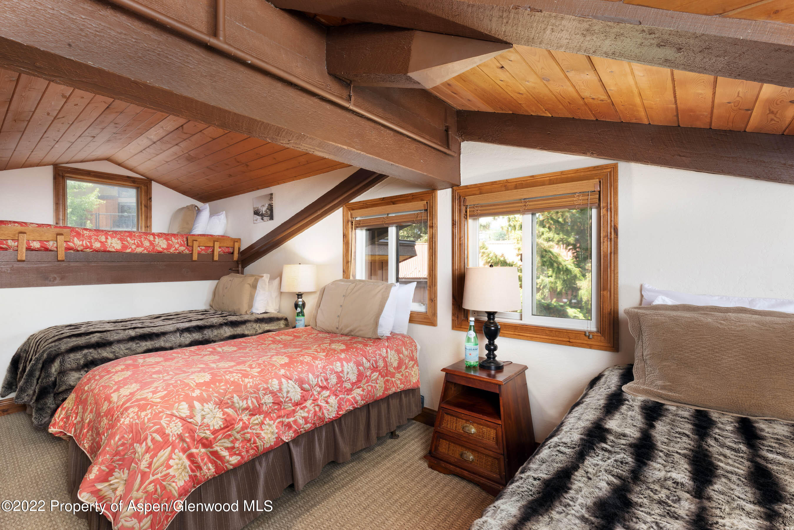 400 Wood Road, Unit 2310 Snowmass Village, CO 81615 - Photo 9 of 18 a bedroom with bed and window