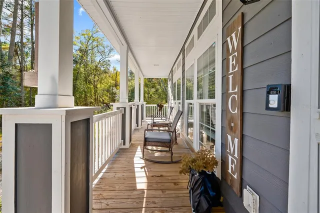 a view of a porch with chairs