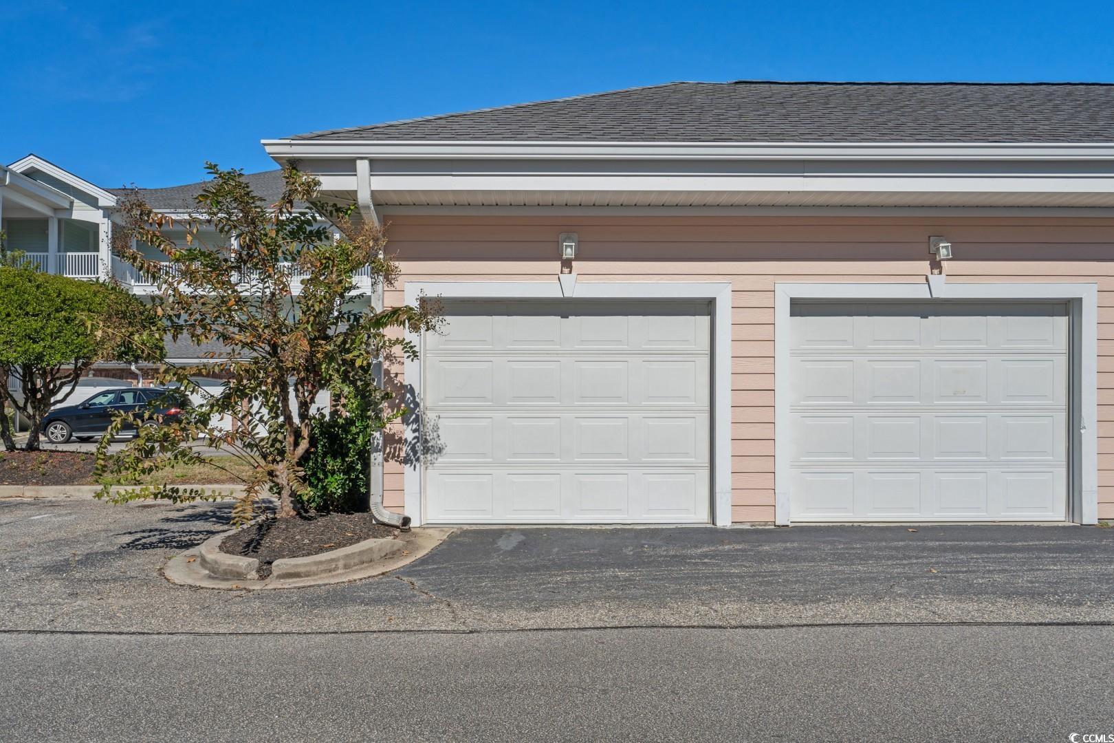 4834 Carnation Circle, Unit 201 Myrtle Beach, SC 29577 - Photo 28 of 40 private garage on the end