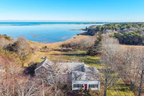 a view of a lake with beach and ocean view