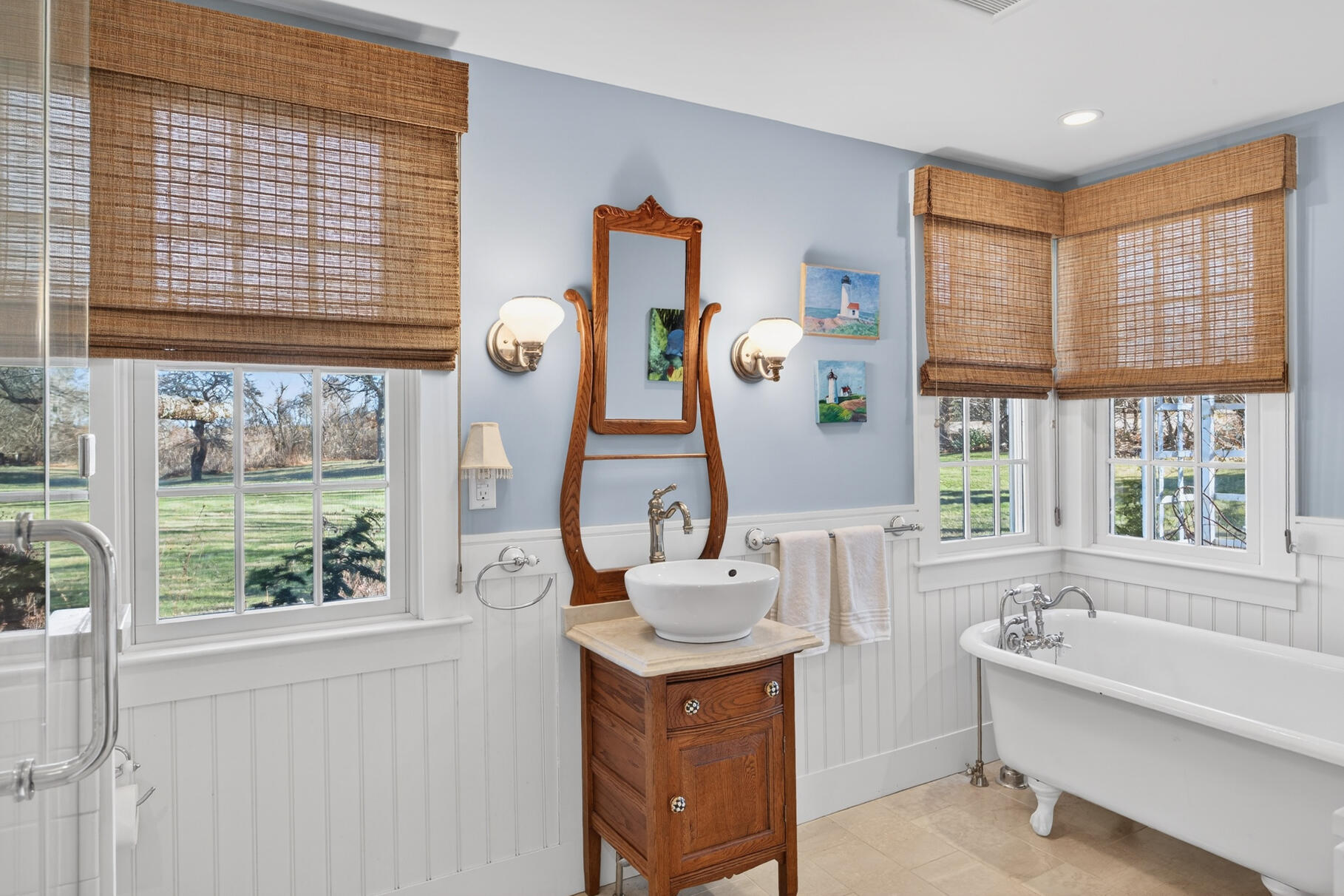 8 Dewey Avenue Sandwich, MA 02563 - Photo 21 of 31 a bathroom with a tub sink and a large window
