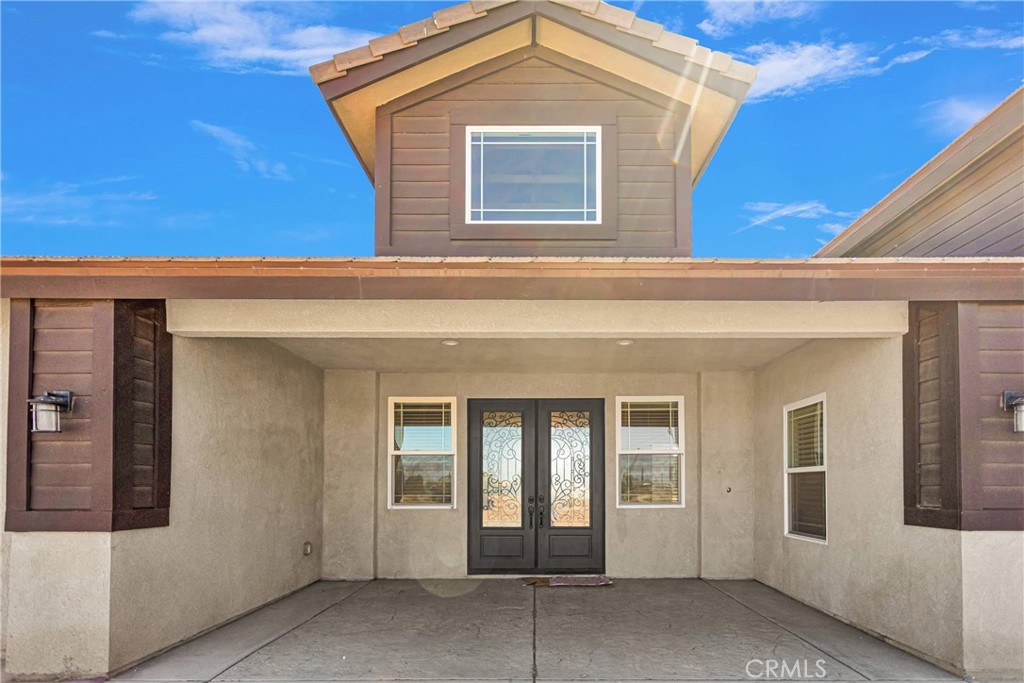 10055 Eaby Road Phelan, CA 92371 - Photo 2 of 19 a front view of a house